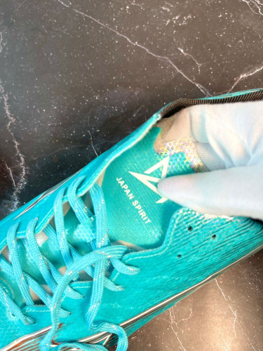 Бутсы Mizuno Alpha FG голубой/коричневый